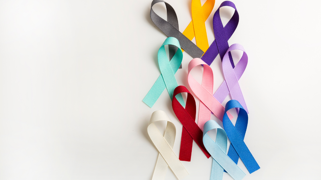 Assorted colorful ribbons representing different types of cancer awareness.