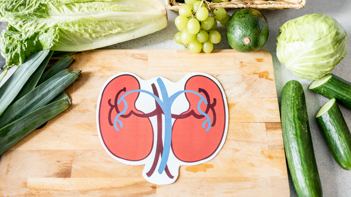 Kidney health illustration with fresh green vegetables representing kidney-friendly foods for Singapore diet