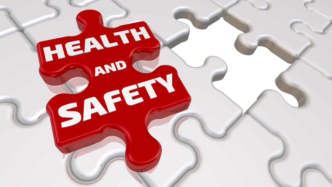 Puzzle pieces with the words health and safety representing workplace wellness strategy in Singapore