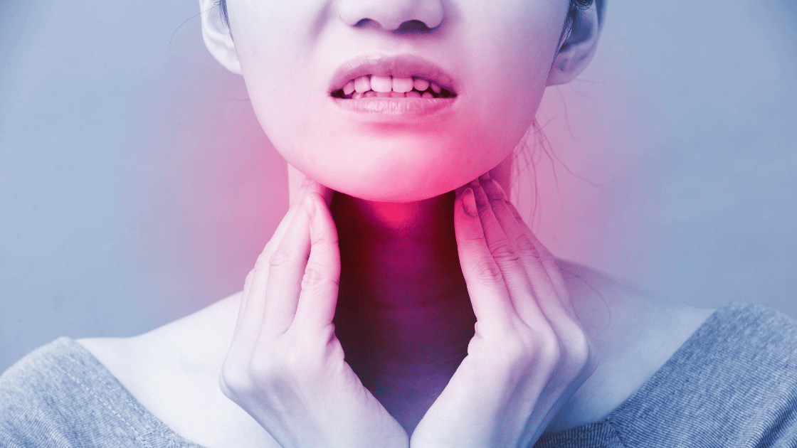 Professional thyroid screening women Singapore - close-up of woman's neck showing thyroid gland area during medical examination