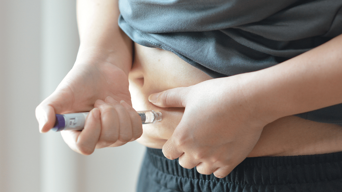 GLP-1 injection administered in the abdomen, representing GLP-1 treatment provided at HOP Medical Centre