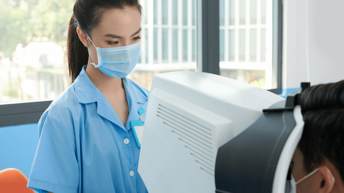 Healthcare professional conducting a tonometry eye pressure test on a patient for glaucoma screening at HOP Medical Centre Singapore
